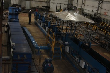 Automated high-pressure washing line for pumping and compression pipes (PCP)